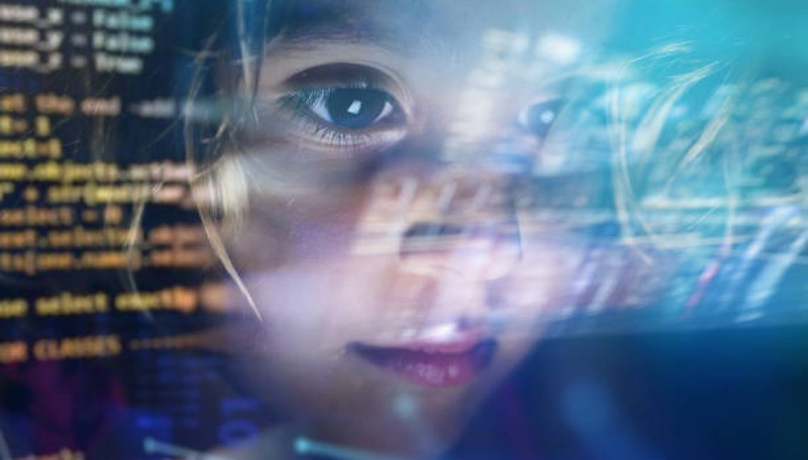 Close up of a little girl looking at some futuristic holograms. Concept: Technology, future, graphics